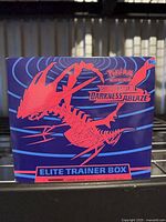 Front of sealed Darkness Ablaze Elite Trainer Box showing artwork and title