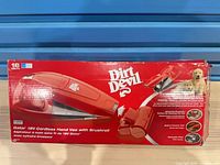Front of boxed Dirt Devil Gator 18V cordless hand vacuum
