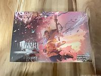 Top view of sealed Final Fantasy Journey of Discovery booster box showing artwork, logos and English edition information