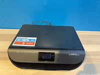 Front and top view of HP Envy 4520 printer with HP Instant Ink card