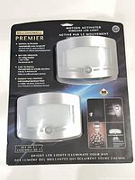 Front of retail package showing two Bell+Howell Premier motion-activated LED lights, set of 2