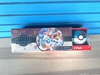 Front view of sealed Pokemon TCG Holiday Calendar and Poké Ball tin 2-pack bundle