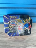 Front view of sealed Zacian V Pokémon TCG tin