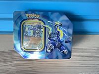 Front view of sealed Pokemon TCG Miraidon ex tin