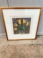 Full view of framed artwork showing subject and frame