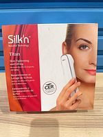 Front of Silk'n Titan boxed device showing brand and product image