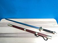 Full view of sword and scabbard