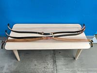 both recurve bows laid flat for full view