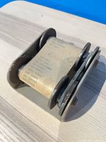 Overall view of calculator showing metal frame, four drums, and paper tape