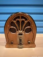 Front view of Thomas wood cathedral tabletop radio