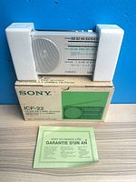 Radio in styrofoam with box and warranty card