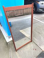 Full view of rectangular teak framed mirror