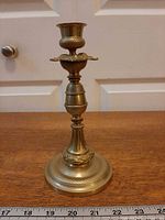 full view of brass candlestick front