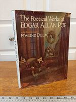 Front of dust-jacketed book showing title and Dulac credit