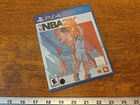 Front of NBA 2K22 PS4 case showing cover art