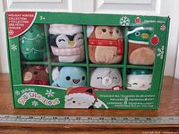 Front view of sealed Squishmallows Holiday Winter Collection box showing all eight plush ornaments