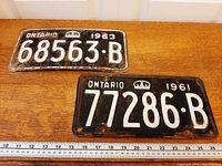 Both Ontario licence plates front view with ruler for scale