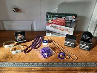 All items overview on tabletop with ruler for scale