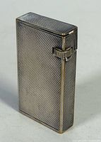 Front angled view of textured Dunhill lighter