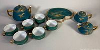 Full 15-piece Kutani porcelain tea set displayed