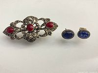 Brooch and earrings full view