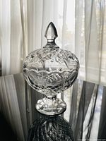 Full view of crystal candy dish with lid on pedestal