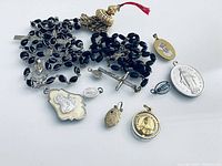 Assorted religious jewelry laid out