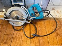 Full view of Makita 5077B hypoid saw with cord