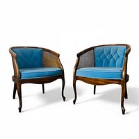 Full view pair of cane back chairs with blue velvet upholstery