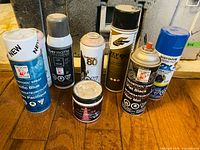 Group shot of all paint cans and jar