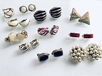 All ten pairs of earrings laid out together