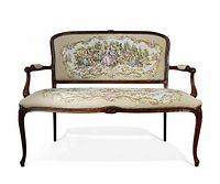 Front view of carved tapestry loveseat