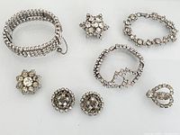 Group shot of all eight rhinestone pieces