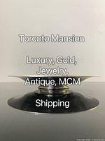 Side profile of shallow silverplate bowl