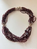 Bracelet laid flat showing multiple strands and clasp