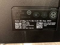 Label showing Dell SE3223Q model and specifications