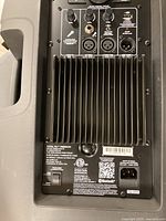 Rear panel of ION Total PA Freedom showing inputs, controls, model label