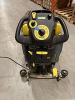 Front control panel, handle and scrub head of Kärcher floor scrubber