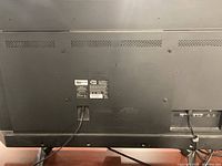 Back view of Sharp LC-50LB481C showing model label, ports and cords