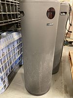 Two Surgically Clean Air Jade 2.0 tower air purifiers standing side by side