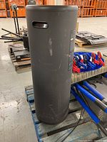 Full view of black cylindrical Surgically Clean Air Jade 2.0 air purifier showing condition