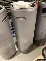 Three grey Surgically Clean Air Jade 2.0 air purifiers standing side by side