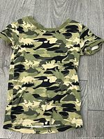 Front view of dinosaur camo t-shirt