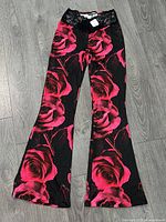 Full view of floral flare pants front side