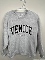 Front view of heather grey Refuge Athletics Venice sweatshirt