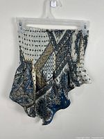 Front view of smocked paisley Shein bandeau top