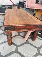 front perspective of coffee table showing legs and top