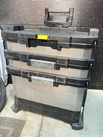 Front view of Stanley FatMax organizer showing three drawers and yellow latch