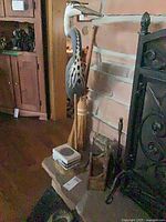 Tall wooden crane, broom, ceramic card box, partial ceramic snake