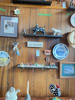 overall lot on wood-panelled wall